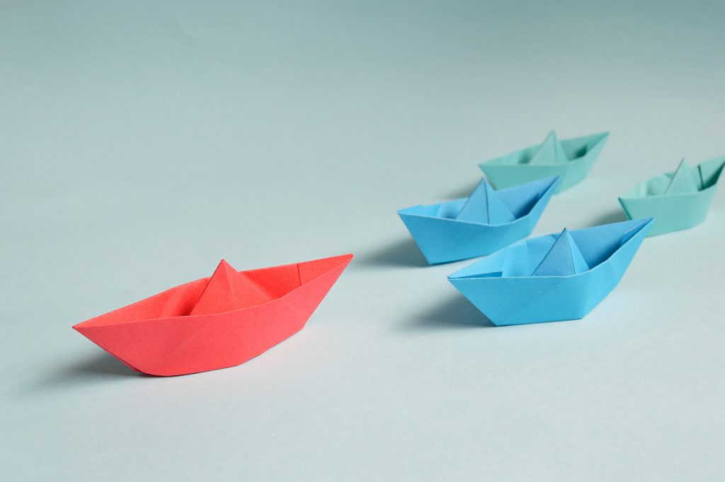 Canva-Paper-Boats-on-Solid-Surface-1024x681